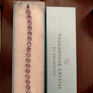 Touchstone crystal Swarovski silver bracelet with amethyst crystals. Never worn.